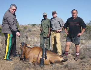 Robert's trophy Red Hartebeast, from left to right: Robert Cady, Smilee, Marcus Case and Alvin